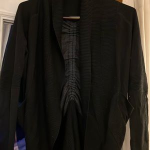 Two lululemon reversible sweaters